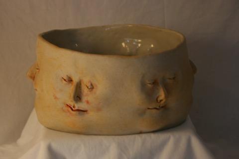 Bowl of many faces by artist Jenn Peren