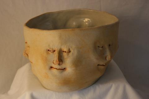 Bowl of many faces by artist Jenn Peren